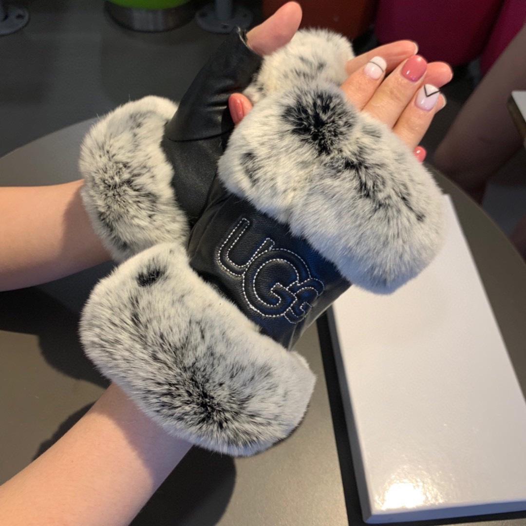 Gants Gucci avec Motif Double G signature en noir