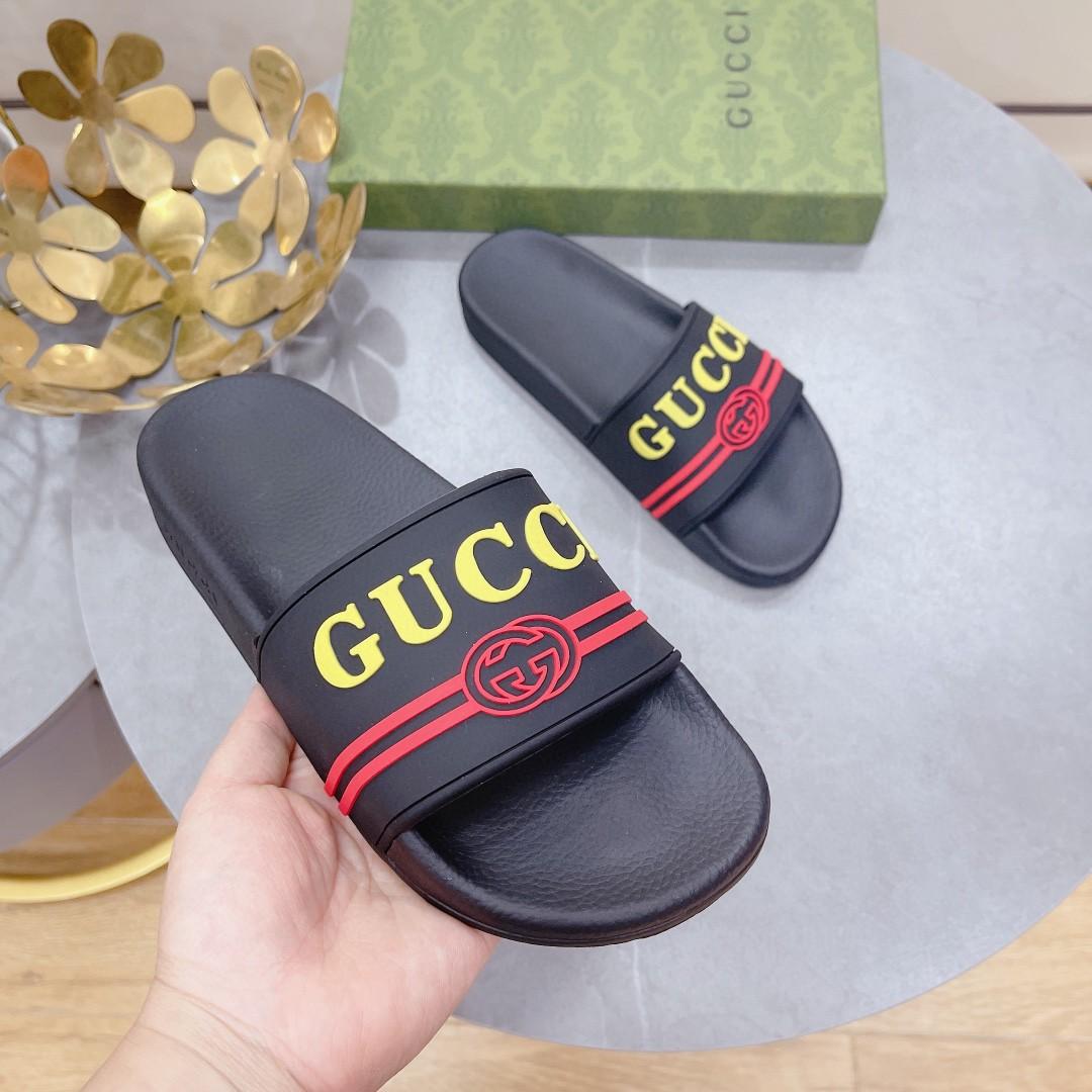 Gucci Logo homme en caoutchouc Diapositive noir rouge et jaune pour les hommes 522887