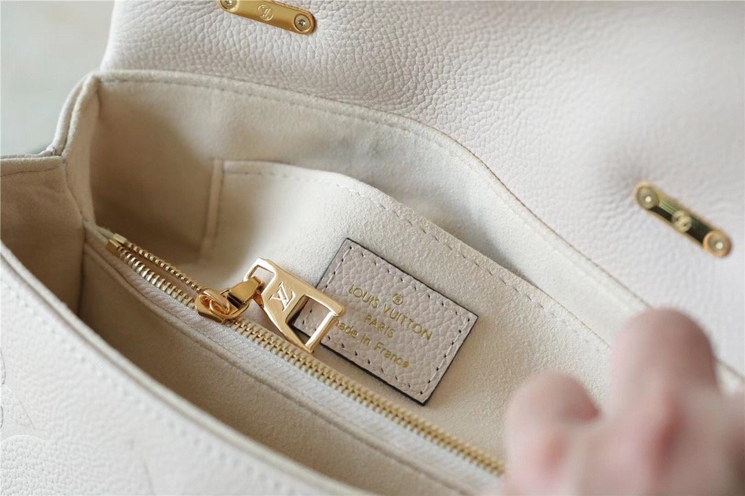 Louis Vuitton Madeleine BB Monogram Empreinte Creme Beige For Women, Women's Handbags, Shoulder and Crossbody Bags 9.4in/24cm LV M46008